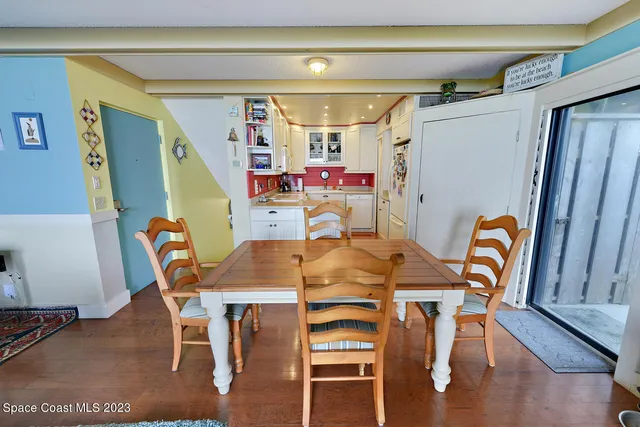 a view of a hallway with shelves