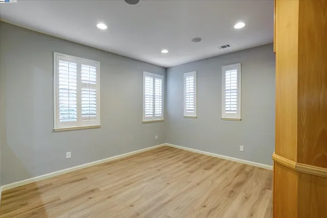 a view of livingroom with wooden floor