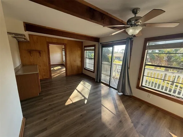 a view of entryway with wooden floor