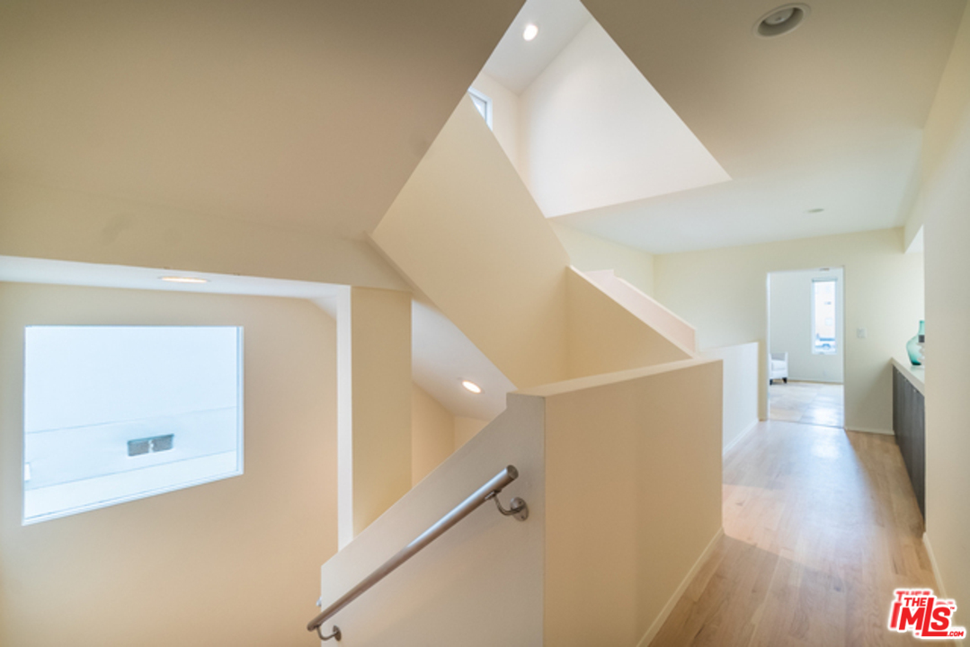 4515 Roma Court Marina del Rey, CA 90292 - Photo 11 of 31 a view of a hallway with wooden floor