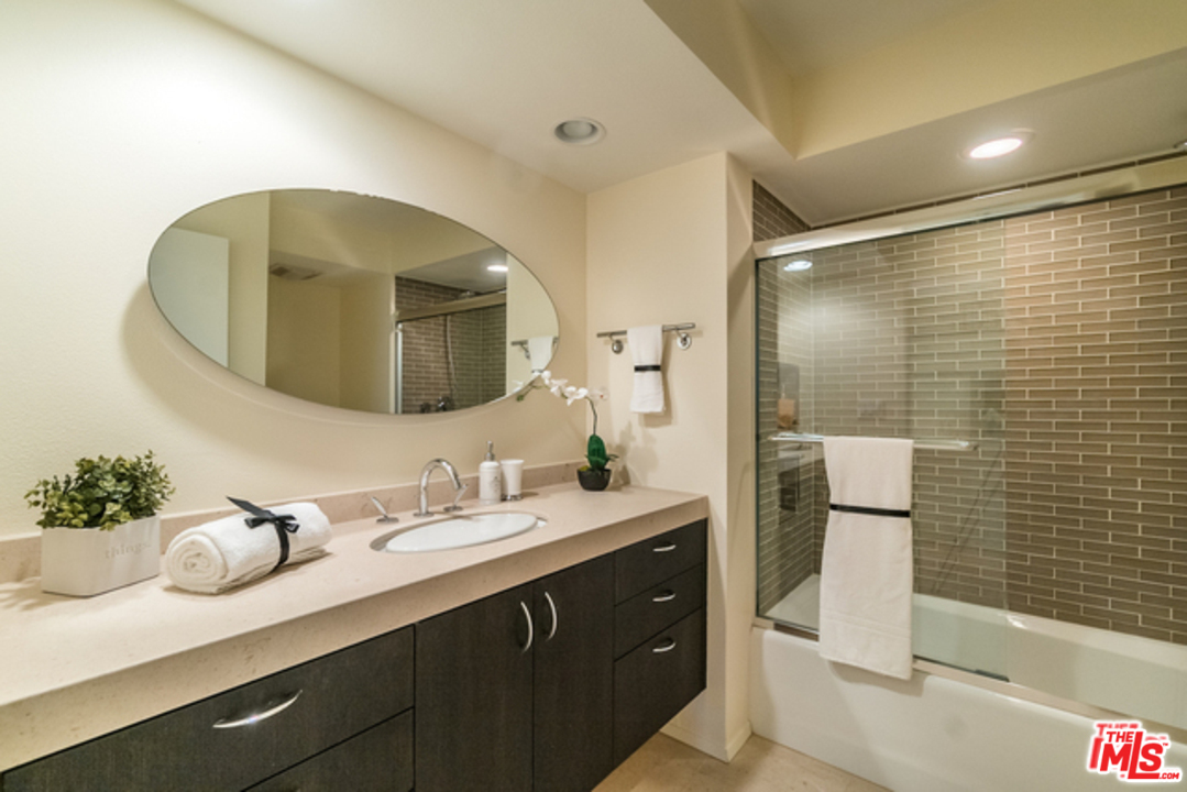 4515 Roma Court Marina del Rey, CA 90292 - Photo 13 of 31 a bathroom with a double vanity sink mirror and double