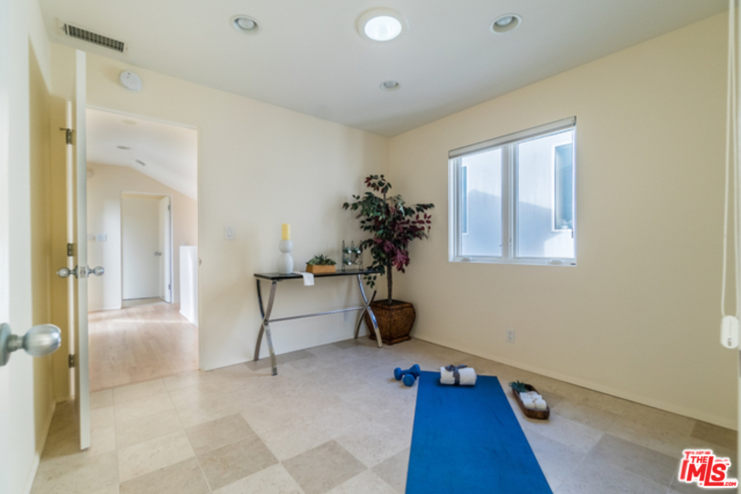 4515 Roma Court Marina del Rey, CA 90292 - Photo 19 of 31 a view of a workspace with furniture and a window