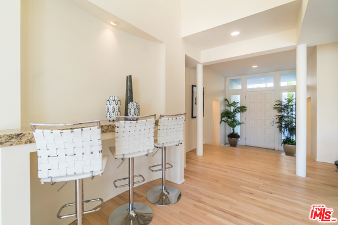 4515 Roma Court Marina del Rey, CA 90292 - Photo 3 of 31 a view of a dining room with furniture and wooden floor