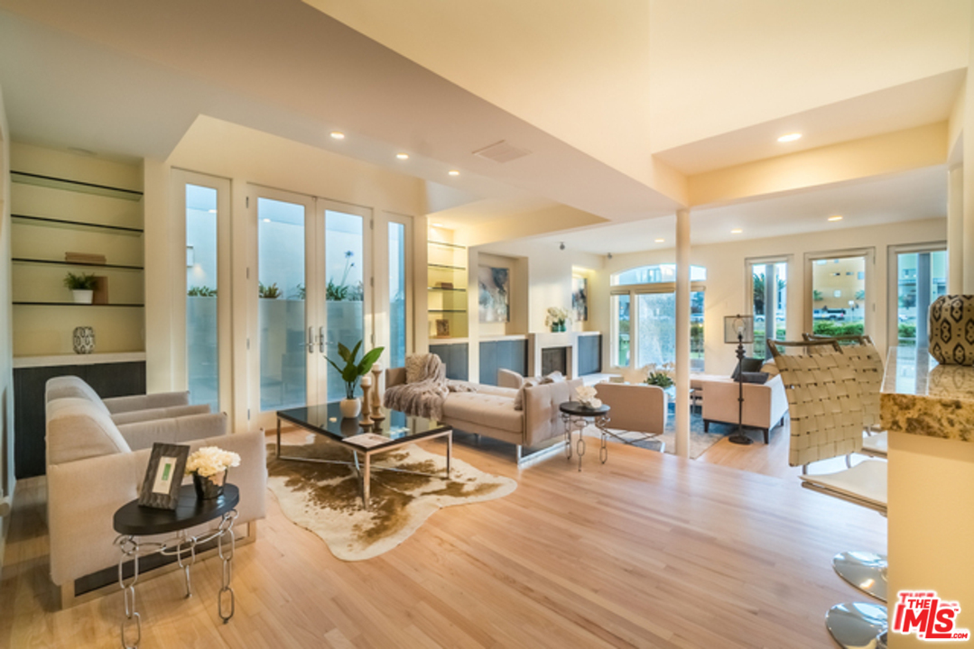 4515 Roma Court Marina del Rey, CA 90292 - Photo 6 of 31 a living room with furniture and a large window