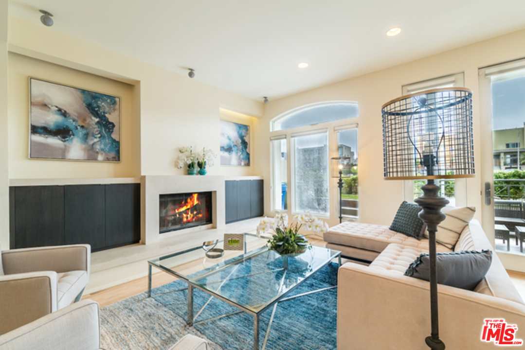 4515 Roma Court Marina del Rey, CA 90292 - Photo 8 of 31 a living room with furniture and a flat screen tv