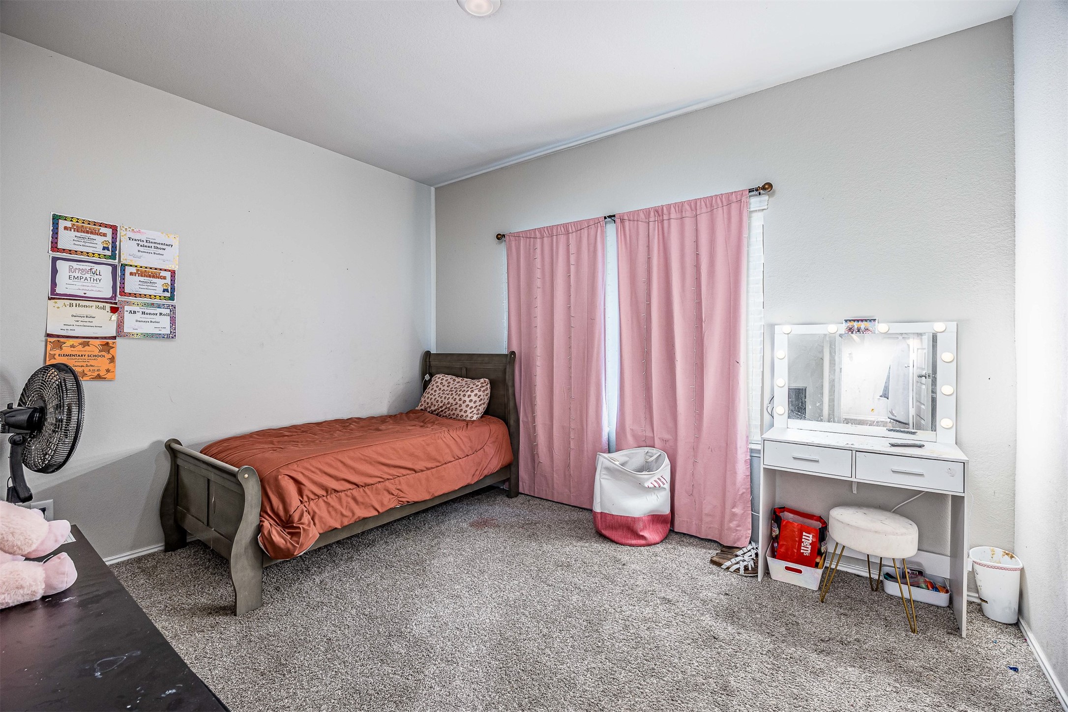 3907 Hawaiian Court Baytown, TX 77521 - Photo 29 of 40 a bedroom with a bed and a chair