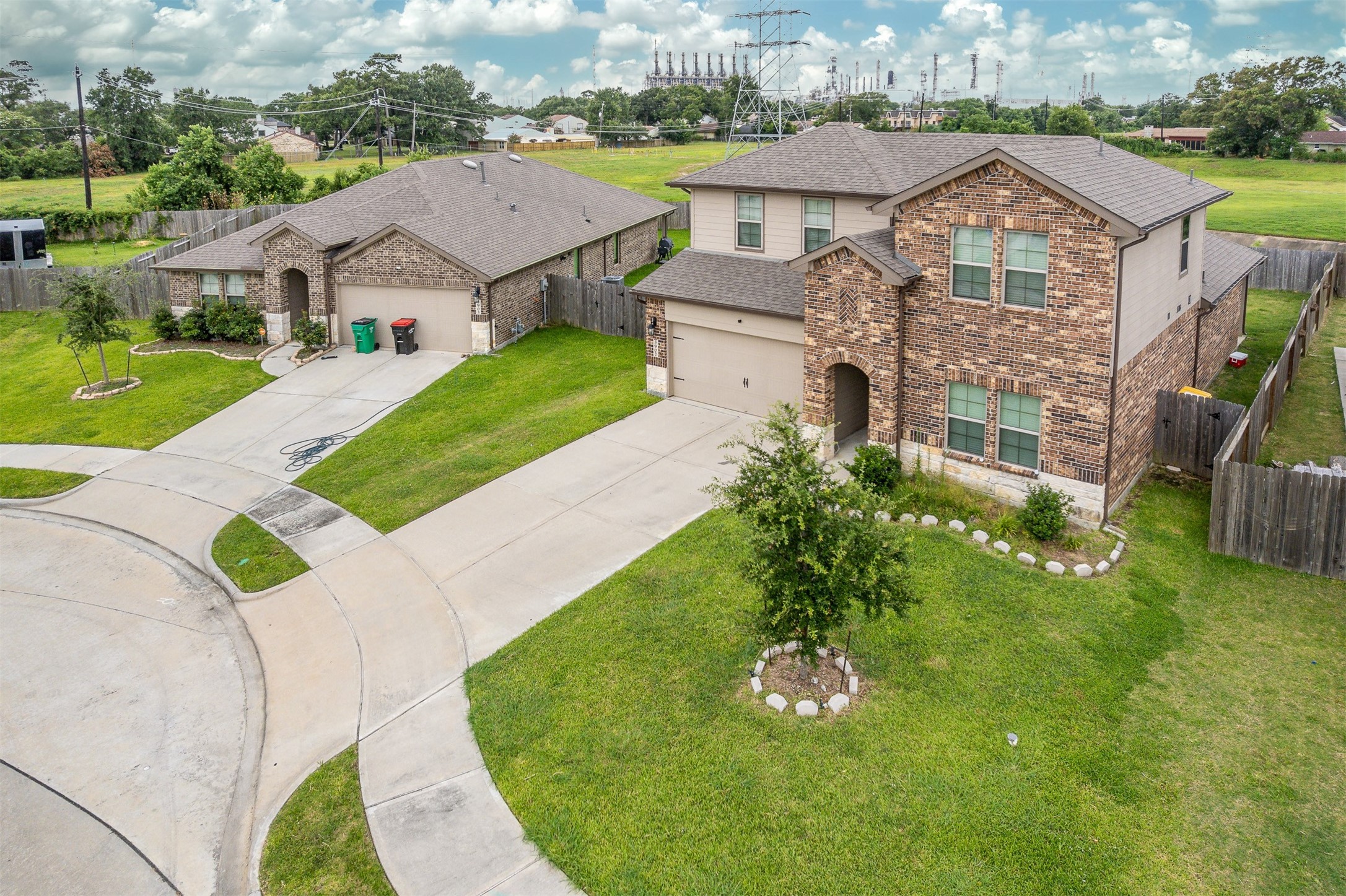 3907 Hawaiian Court Baytown, TX 77521 - Photo 3 of 40 a aerial view of a house with a big yard and potted plants