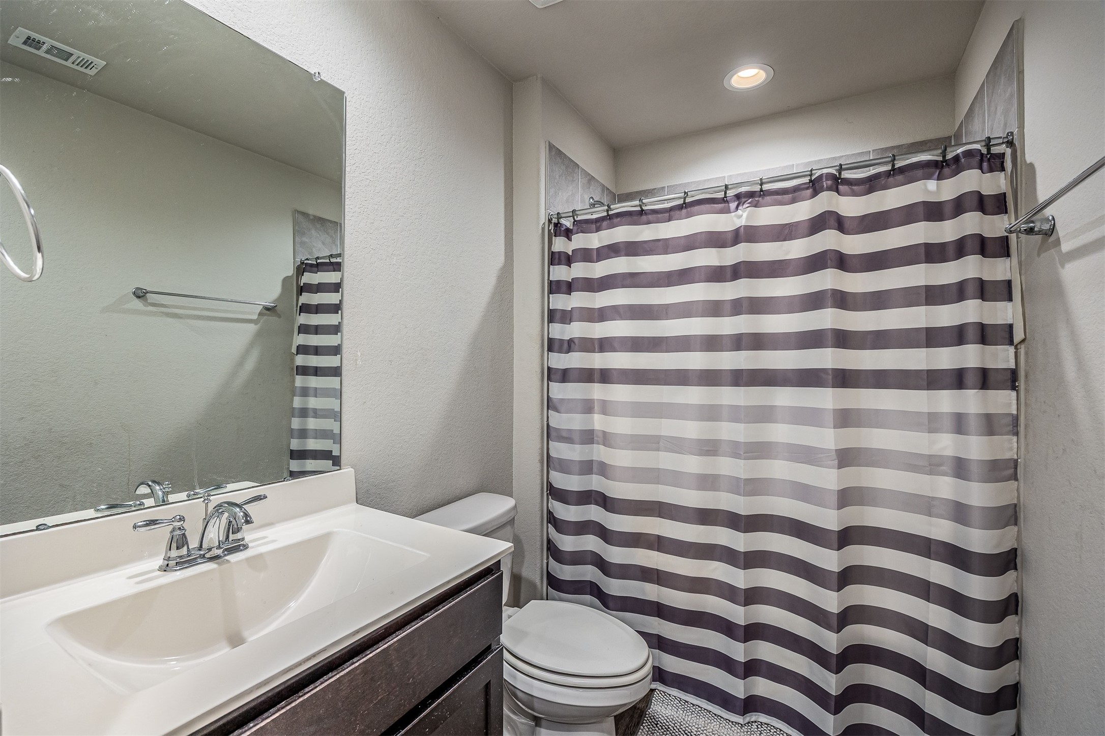 3907 Hawaiian Court Baytown, TX 77521 - Photo 34 of 40 a bathroom with a sink toilet and shower