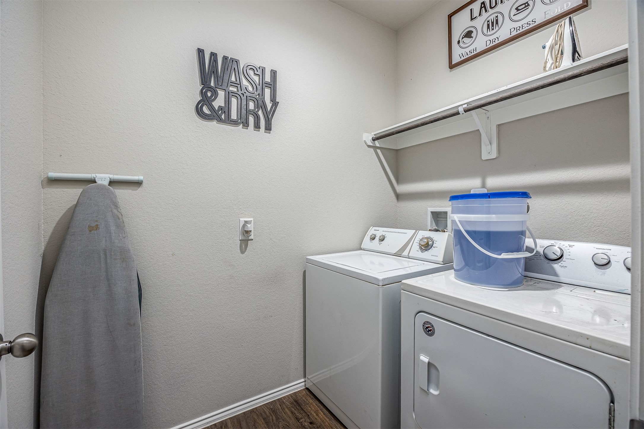 3907 Hawaiian Court Baytown, TX 77521 - Photo 40 of 40 a view of storage and utility room with racks on the wall