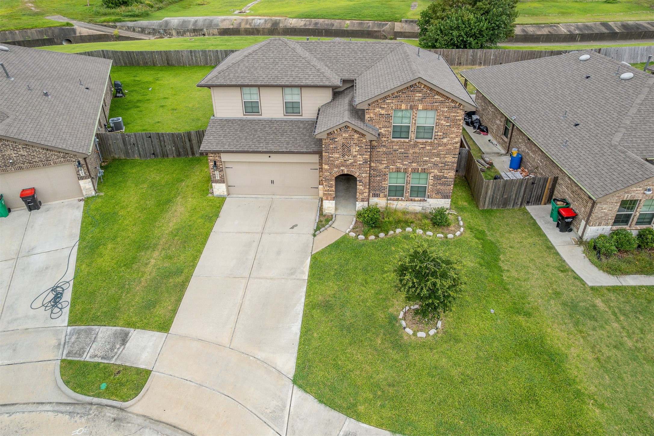 3907 Hawaiian Court Baytown, TX 77521 - Photo 4 of 40 a front view of a house with garden