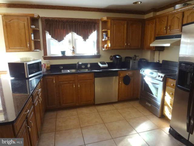 6420 Solomons Island Road Tracys Landing, MD 20779 - Photo 16 of 30 Kitchen