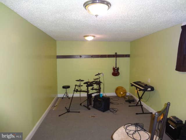 6420 Solomons Island Road Tracys Landing, MD 20779 - Photo 30 of 30 Den-Exercise Room