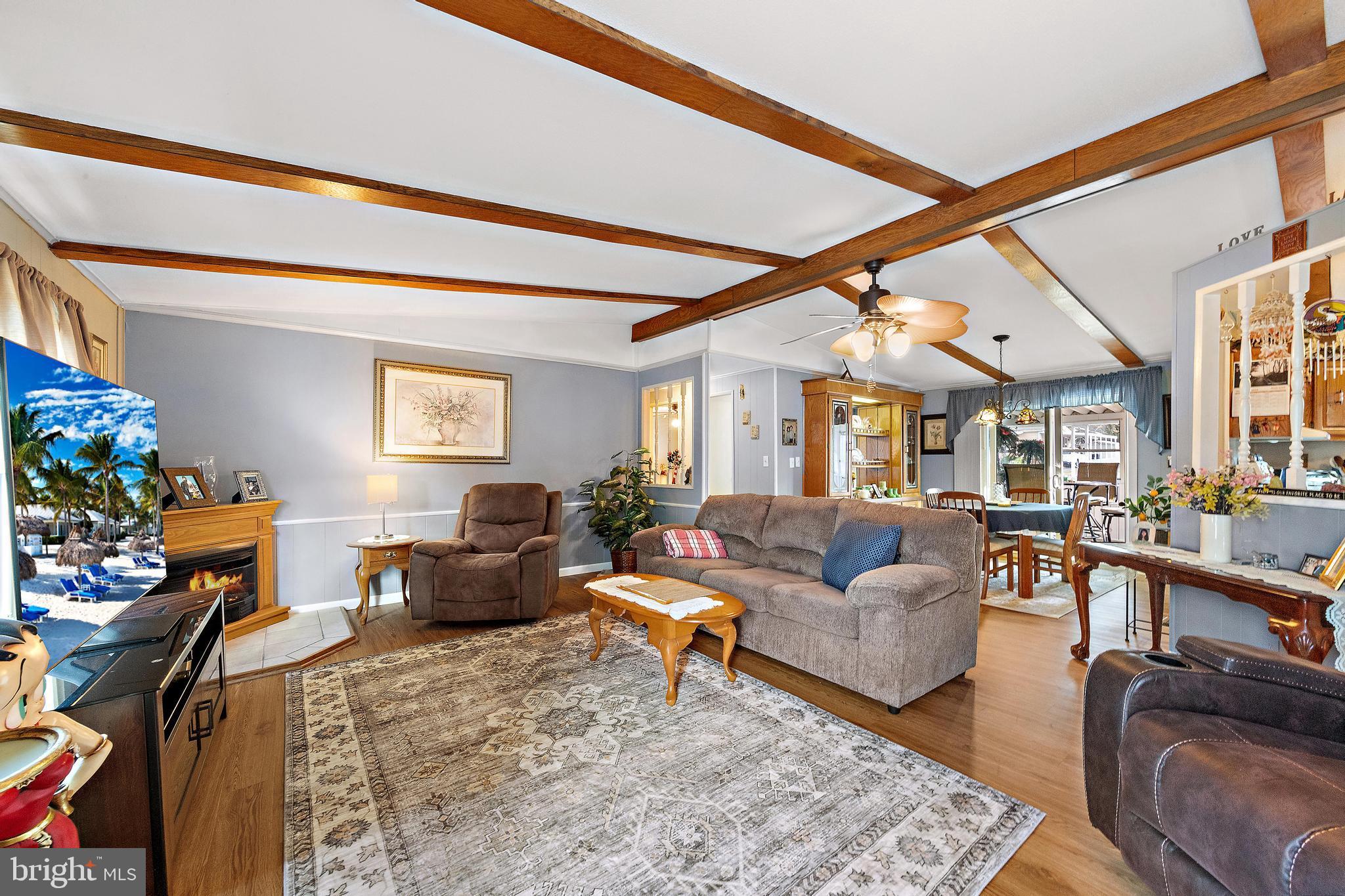 154 Brighton Road Barnegat, NJ 08005 - Photo 12 of 44 a living room with furniture and a flat screen tv