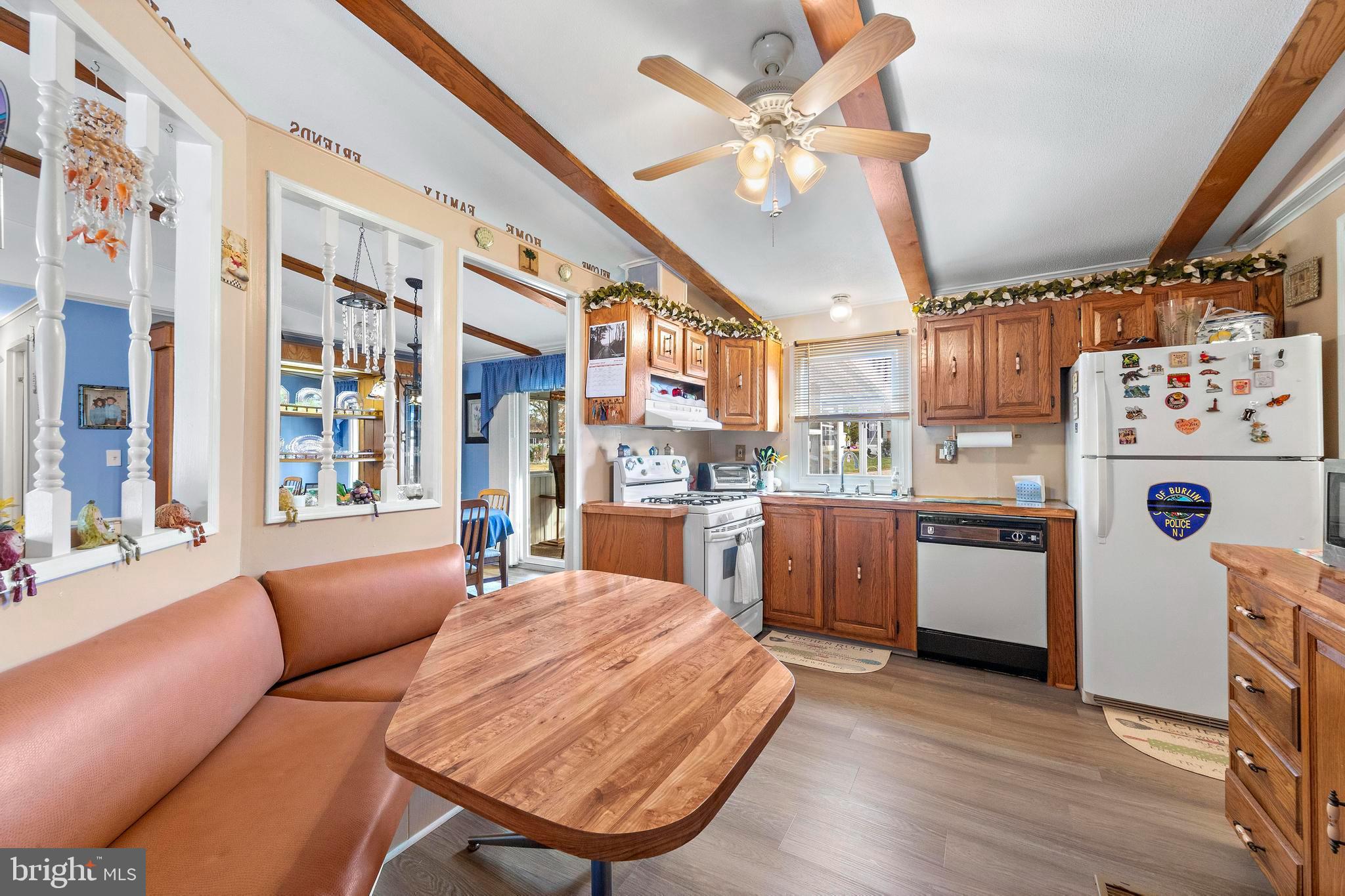 154 Brighton Road Barnegat, NJ 08005 - Photo 21 of 44 a kitchen with cabinets and wooden floors