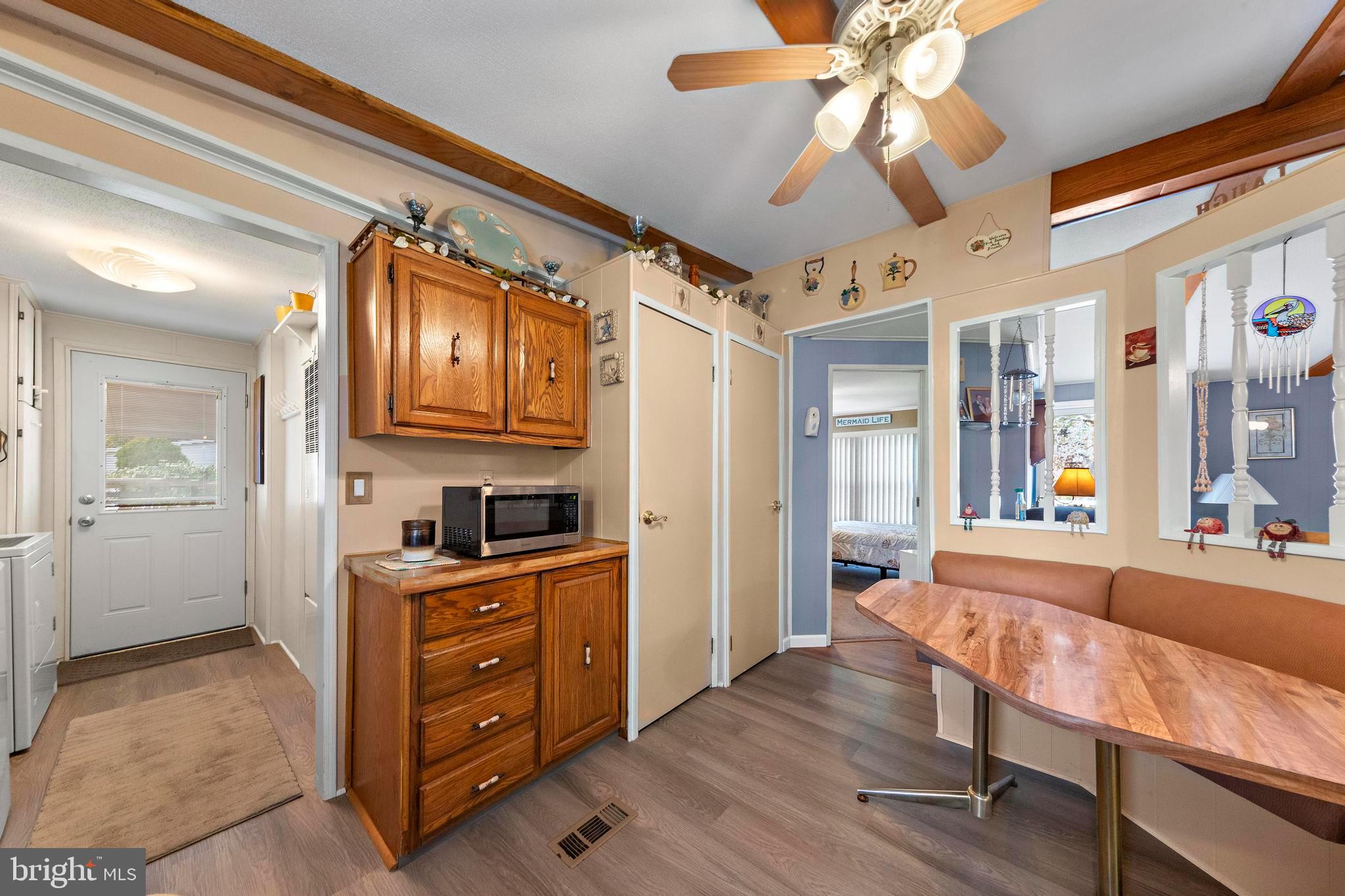 154 Brighton Road Barnegat, NJ 08005 - Photo 22 of 44 a view of a dining room with furniture window and wooden floor