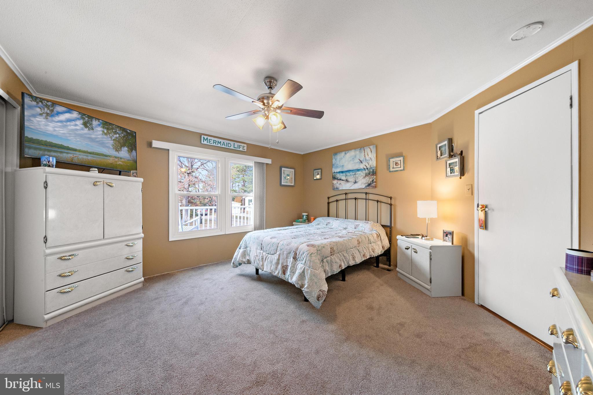 154 Brighton Road Barnegat, NJ 08005 - Photo 26 of 44 a spacious bedroom with a bed dresser and a window