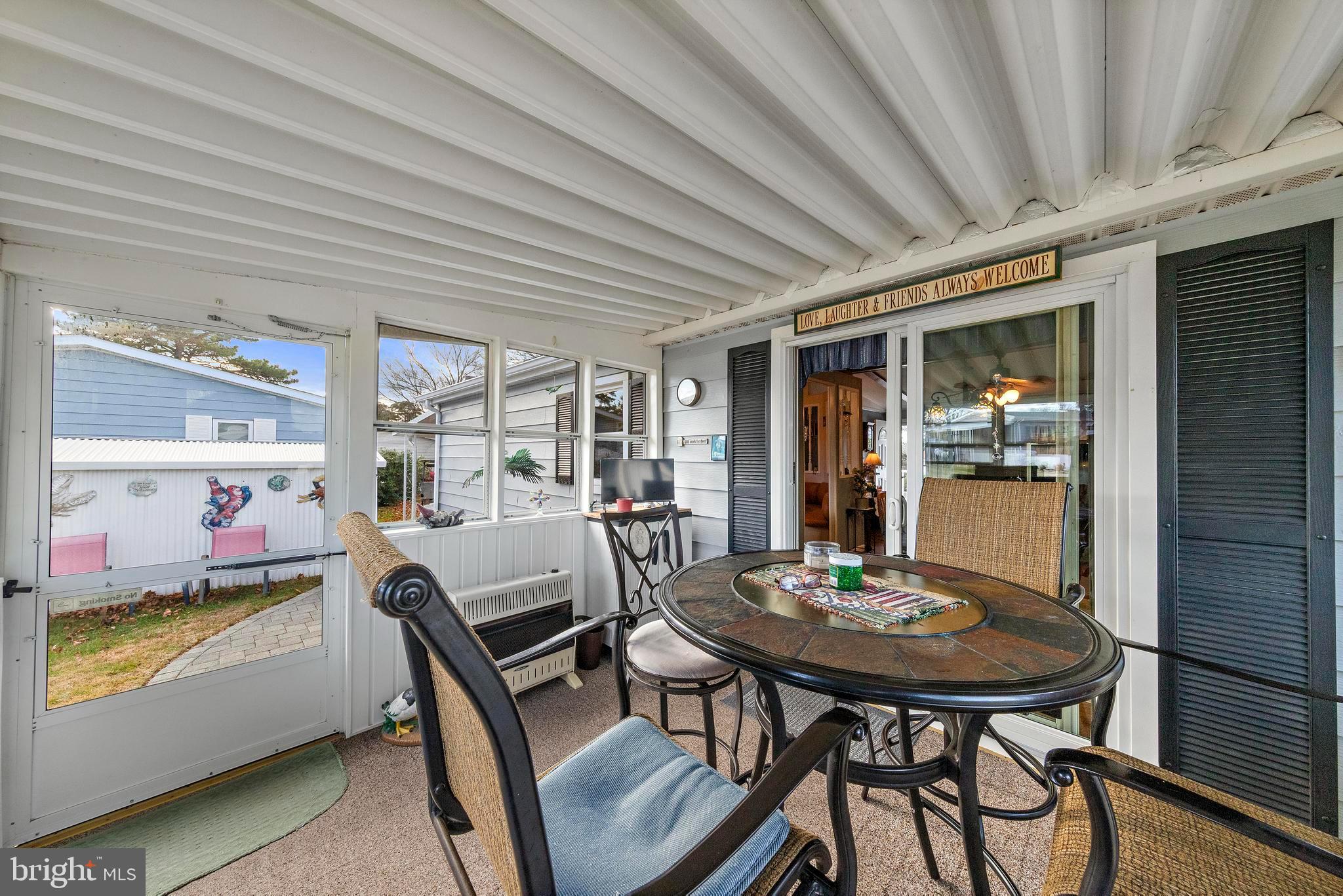 154 Brighton Road Barnegat, NJ 08005 - Photo 38 of 44 a view of a dining room with furniture and chandelier