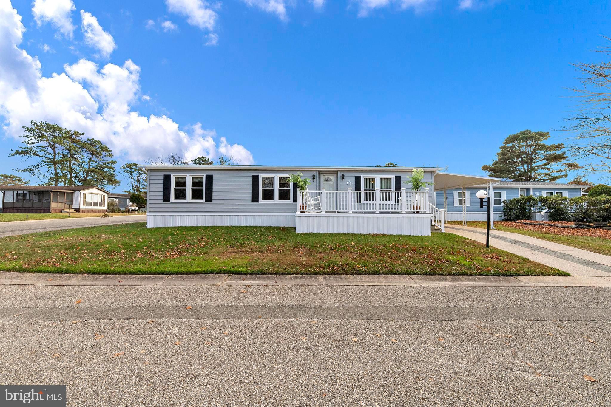 154 Brighton Road Barnegat, NJ 08005 - Photo 4 of 44 a view of residential houses with yard and entertaining space