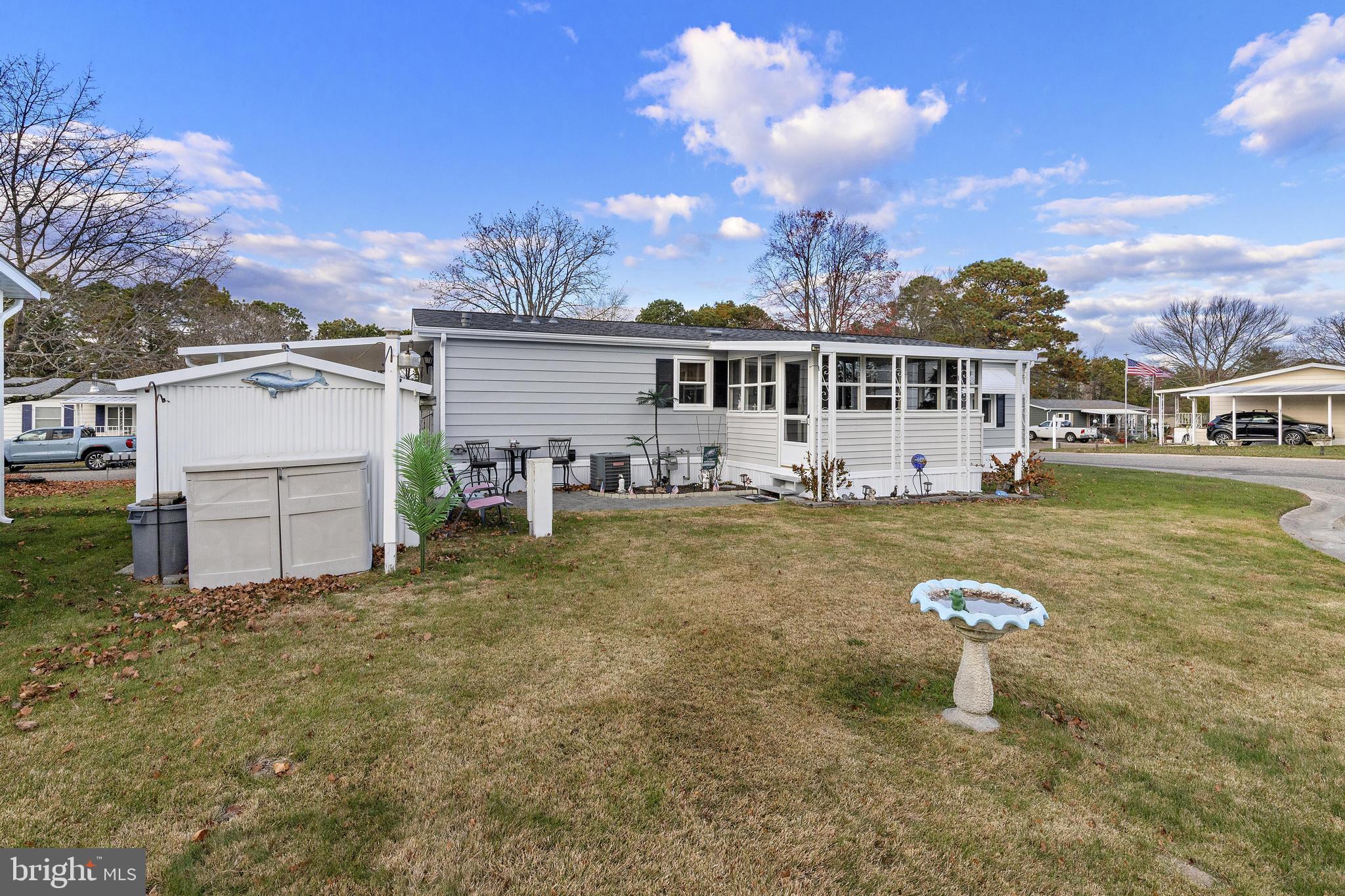 154 Brighton Road Barnegat, NJ 08005 - Photo 42 of 44 a view of a house with a yard