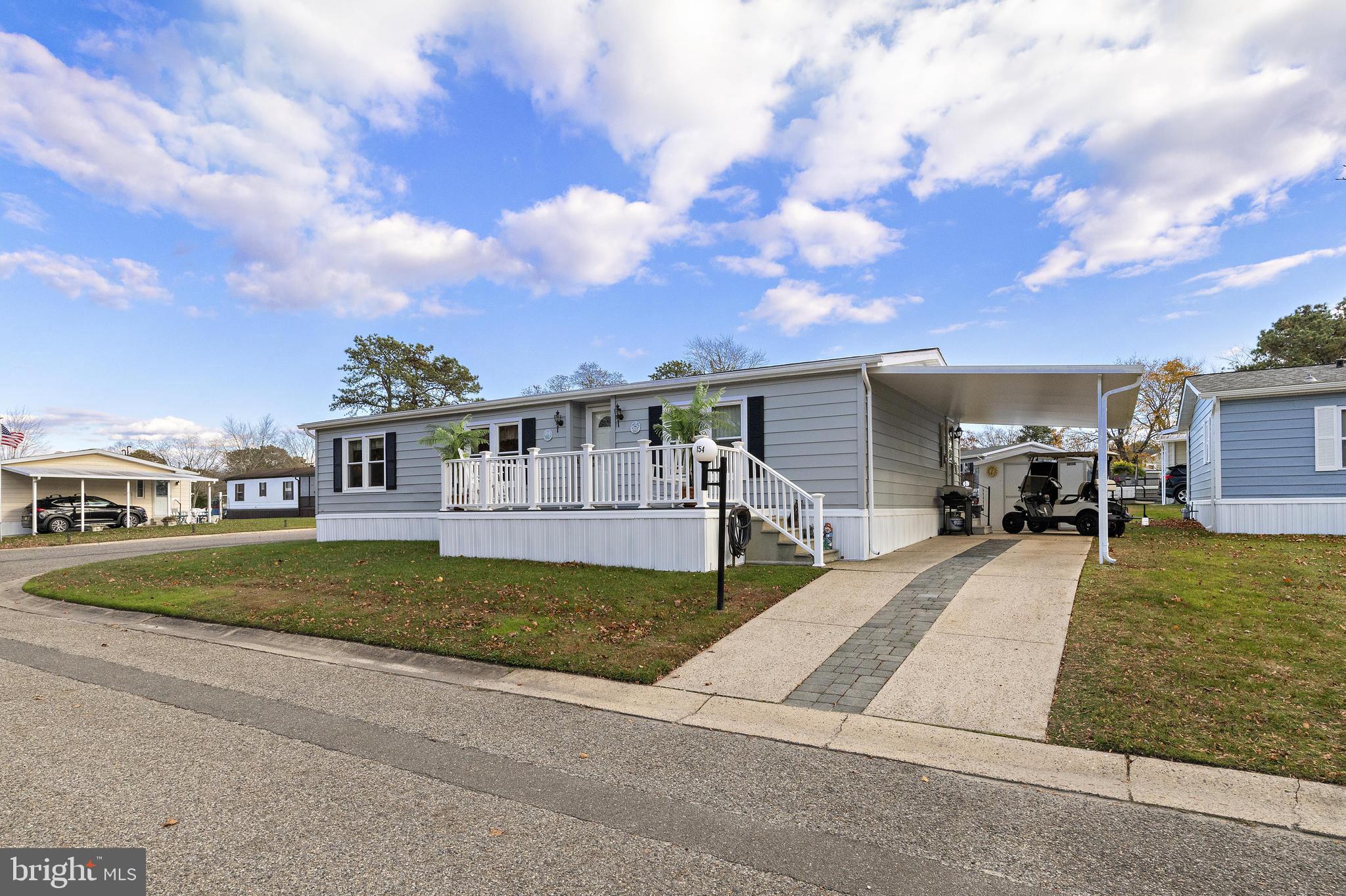 154 Brighton Road Barnegat, NJ 08005 - Photo 43 of 44 a front view of a house with a yard