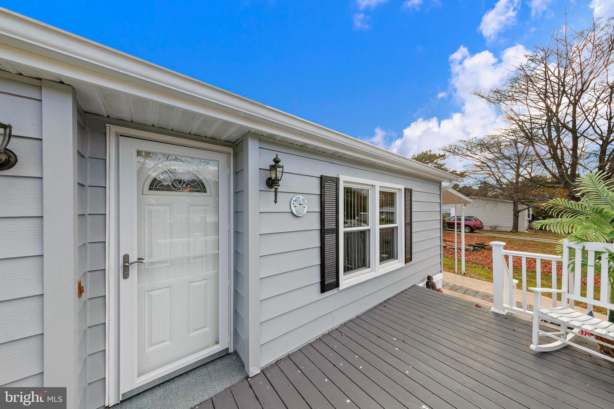 154 Brighton Road Barnegat, NJ 08005 - Photo 6 of 44 a view of a house with a porch