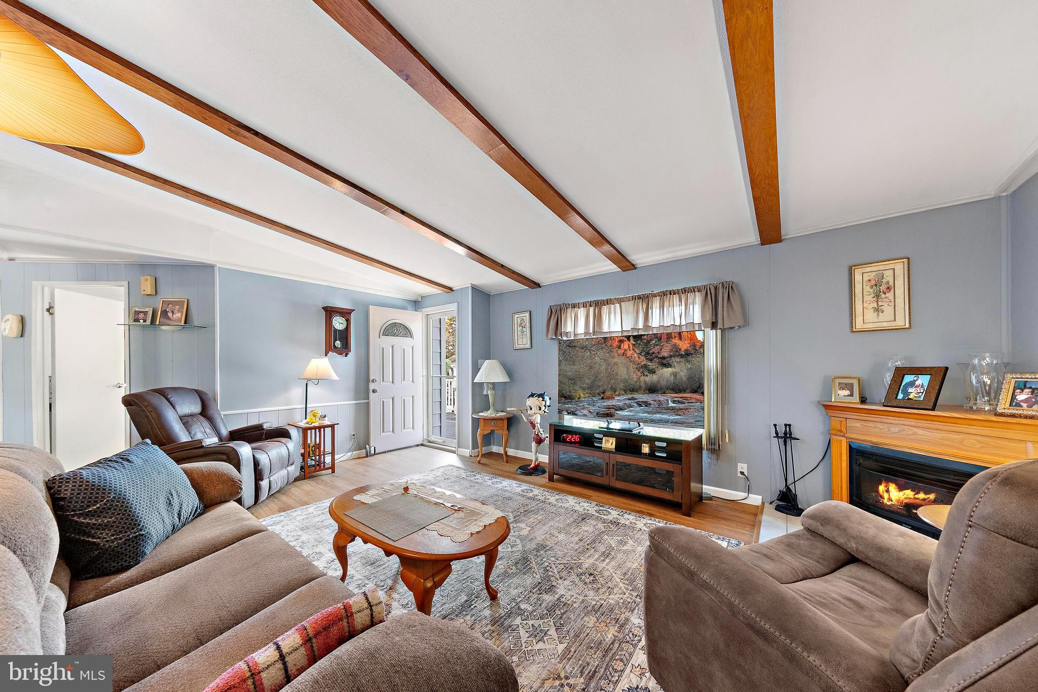 154 Brighton Road Barnegat, NJ 08005 - Photo 8 of 44 a living room with furniture and a flat screen tv
