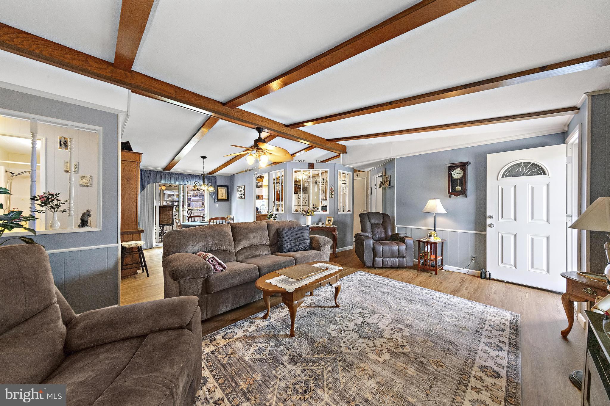 154 Brighton Road Barnegat, NJ 08005 - Photo 9 of 44 a living room with furniture and a large window
