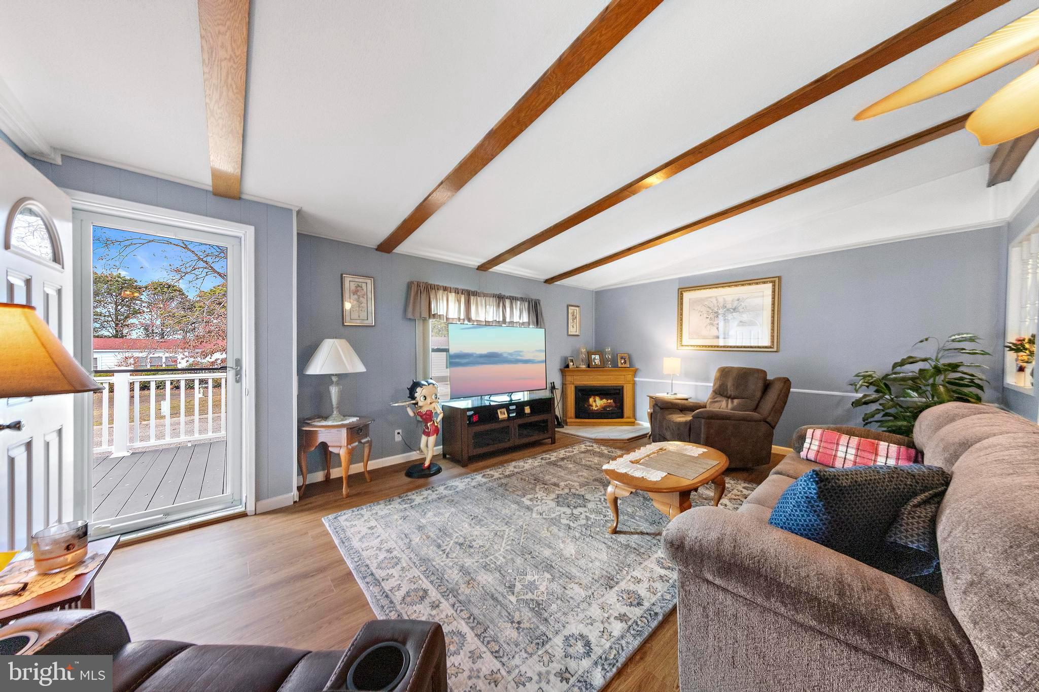154 Brighton Road Barnegat, NJ 08005 - Photo 10 of 44 a living room with furniture and a flat screen tv