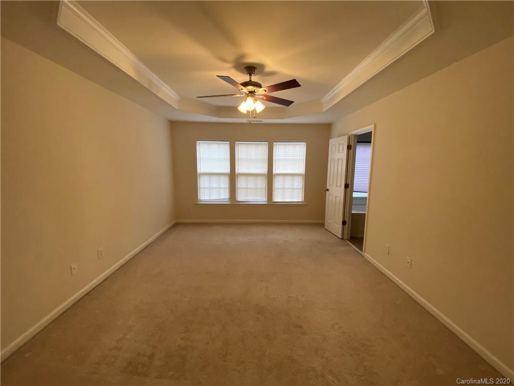 2736 Laurel Cherry Street Raleigh, NC 27612 - Photo 5 of 14 a view of an empty room with a window
