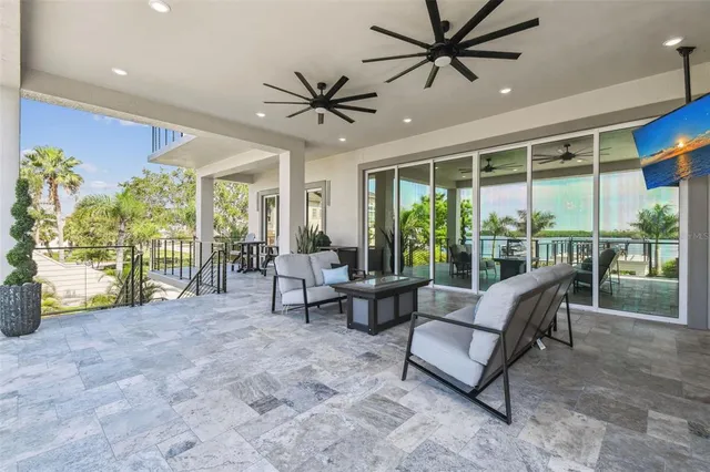a view of a swimming pool with a patio
