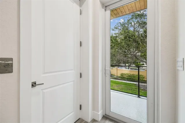 a view of a house with sitting area and garden
