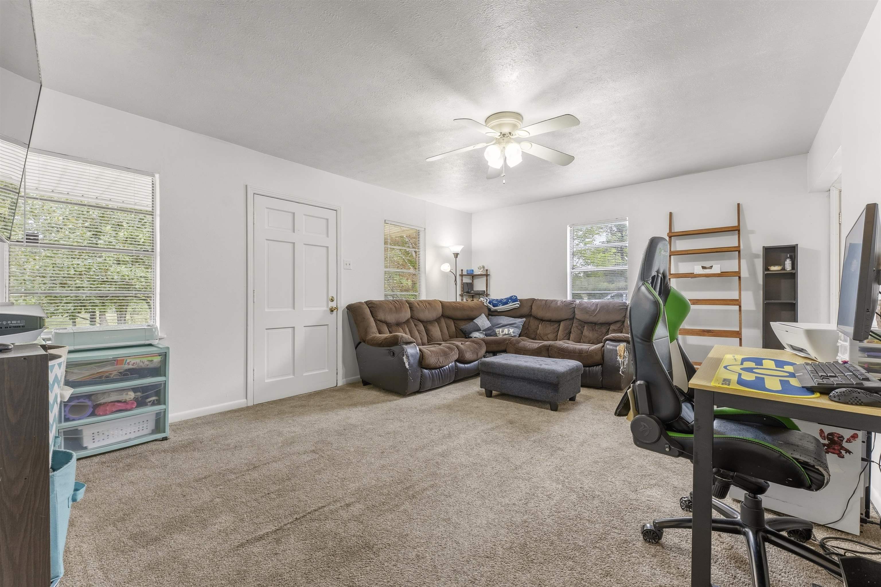17 Walnut Road Munford, TN 38058 - Photo 4 of 20 Carpeted home office featuring a ceiling fan and a textured ceiling