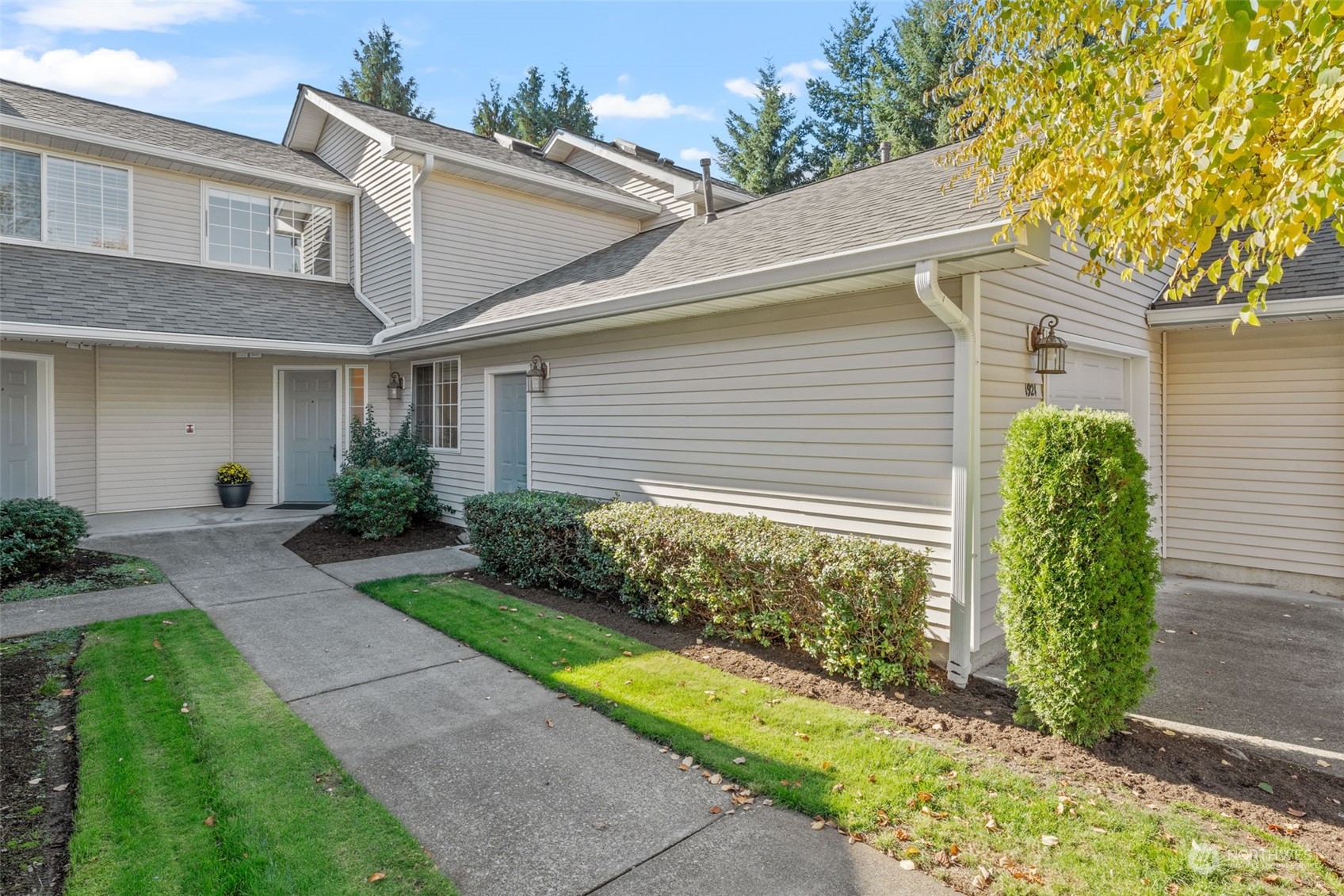 1921 South 368th Place Federal Way, WA 98003 - Photo 1 of 20 a front view of a house with garden