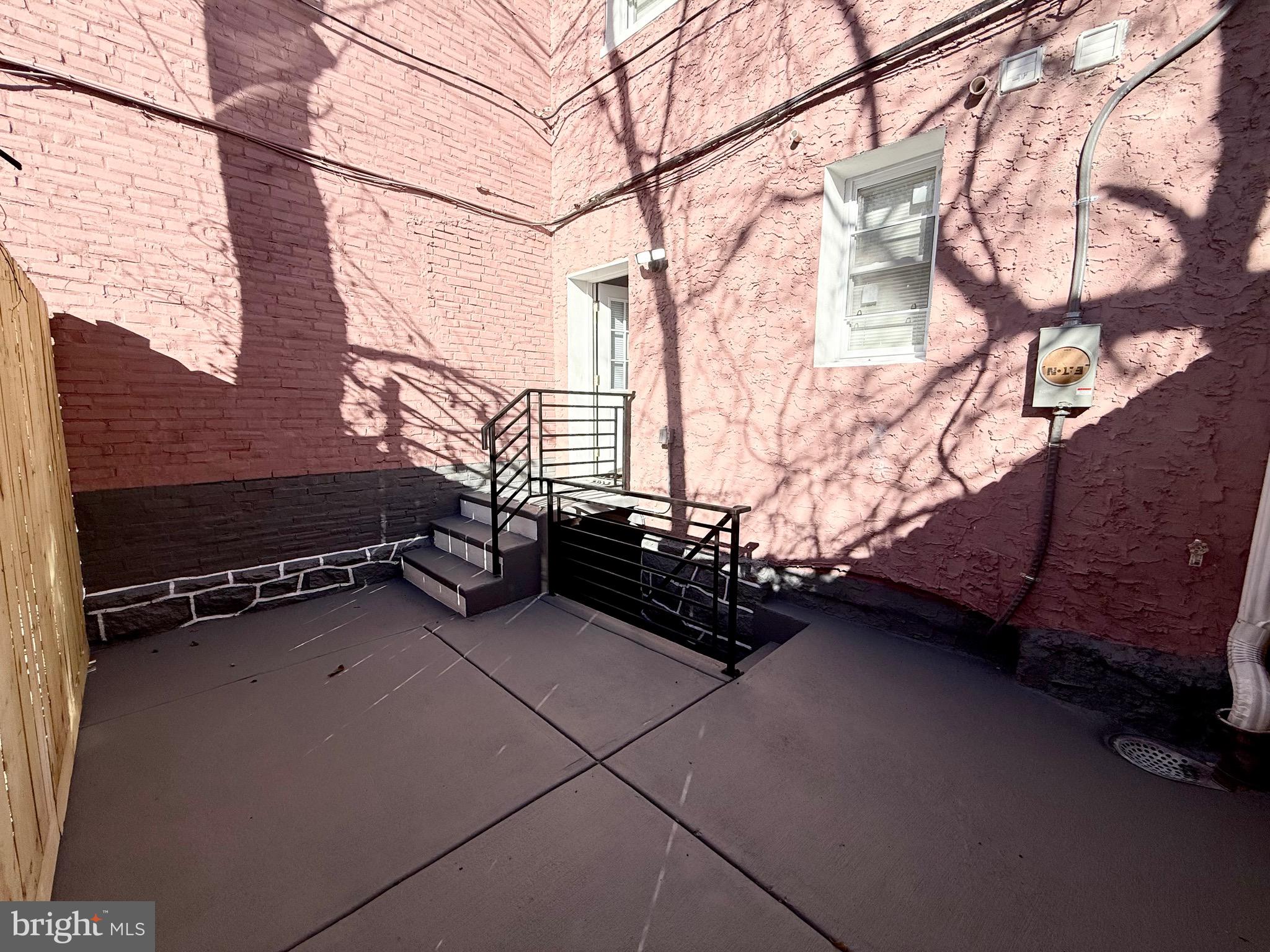 1942 South 56th Street Philadelphia, PA 19143 - Photo 13 of 36 a view of a backyard of the house