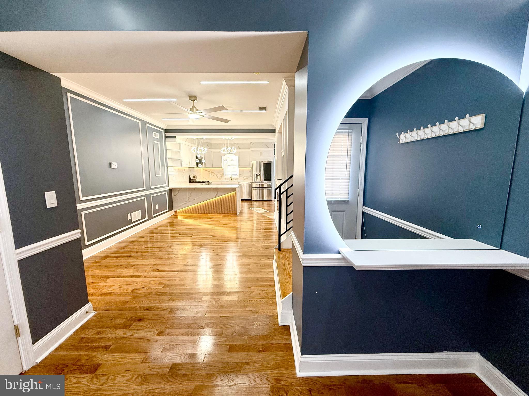 1942 South 56th Street Philadelphia, PA 19143 - Photo 19 of 36 a view of a living room with a wooden floor