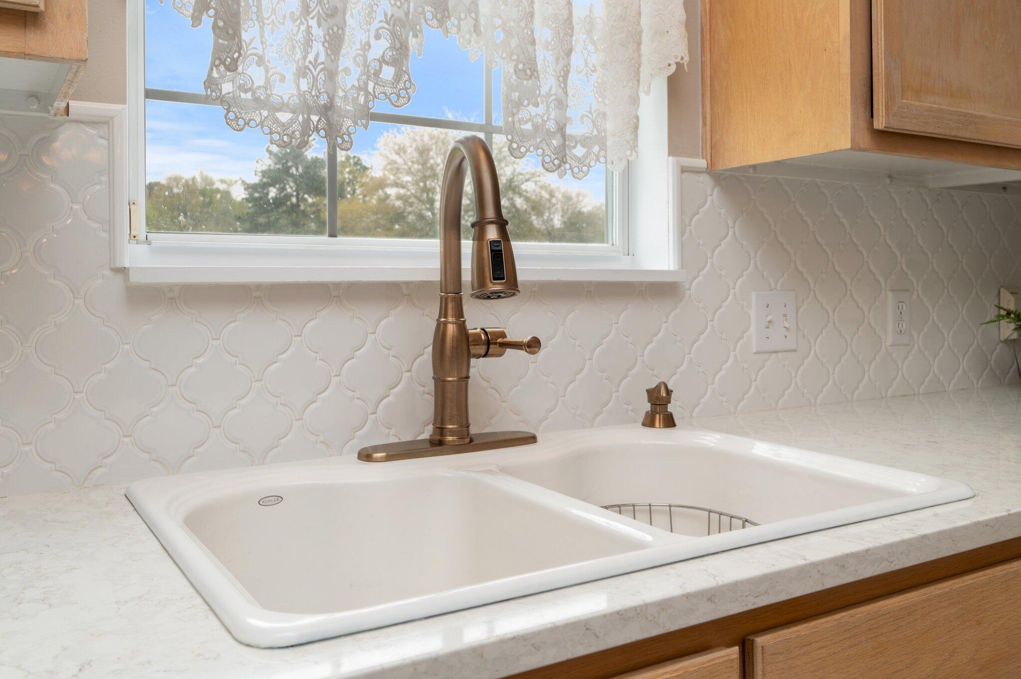 5847 Dairy Road Baker, FL 32531 - Photo 17 of 72 a bathroom with a sink and a window