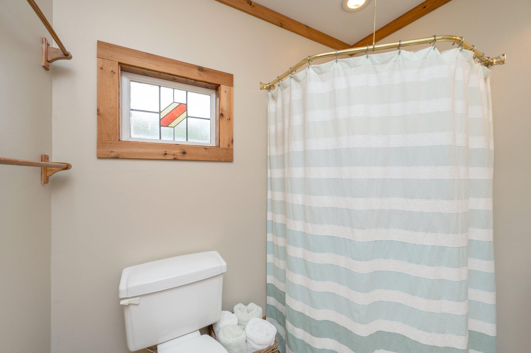 5847 Dairy Road Baker, FL 32531 - Photo 38 of 72 a white toilet sitting next to a shower curtain