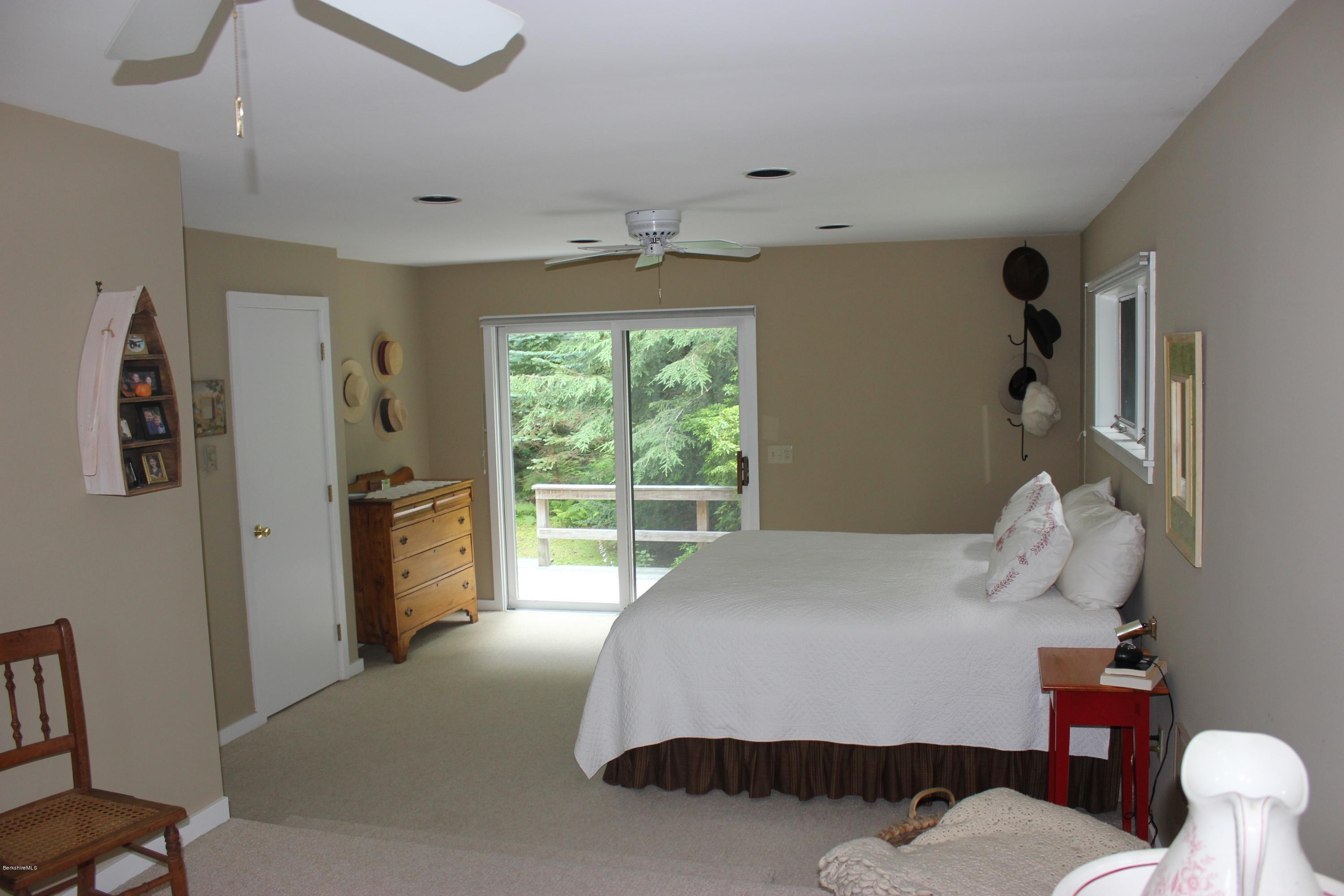 40 Williams Road Becket, MA 01223 - Photo 11 of 18 a bedroom with a bed and wooden floor