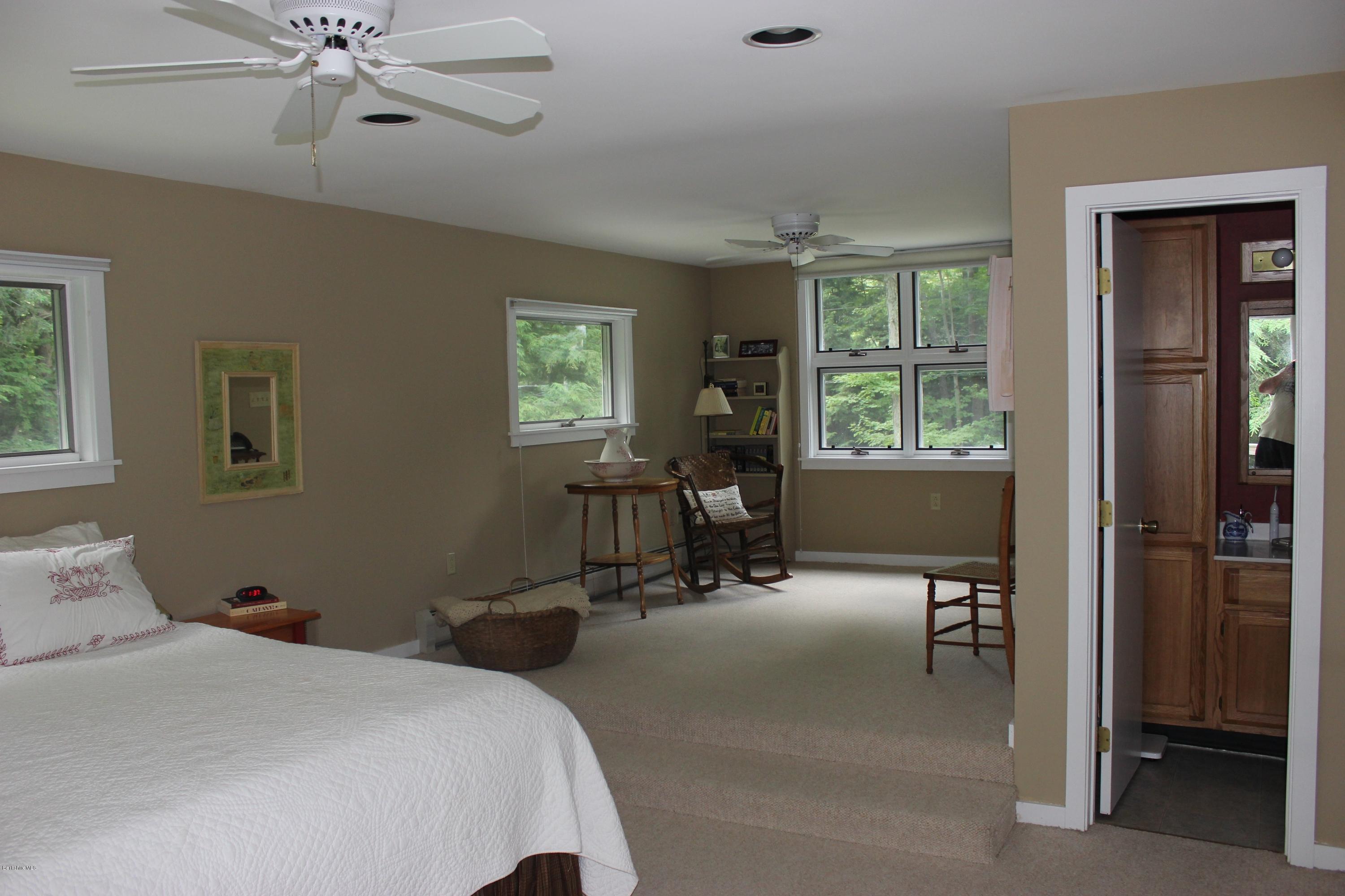 40 Williams Road Becket, MA 01223 - Photo 12 of 18 a bed room with a bed and furniture