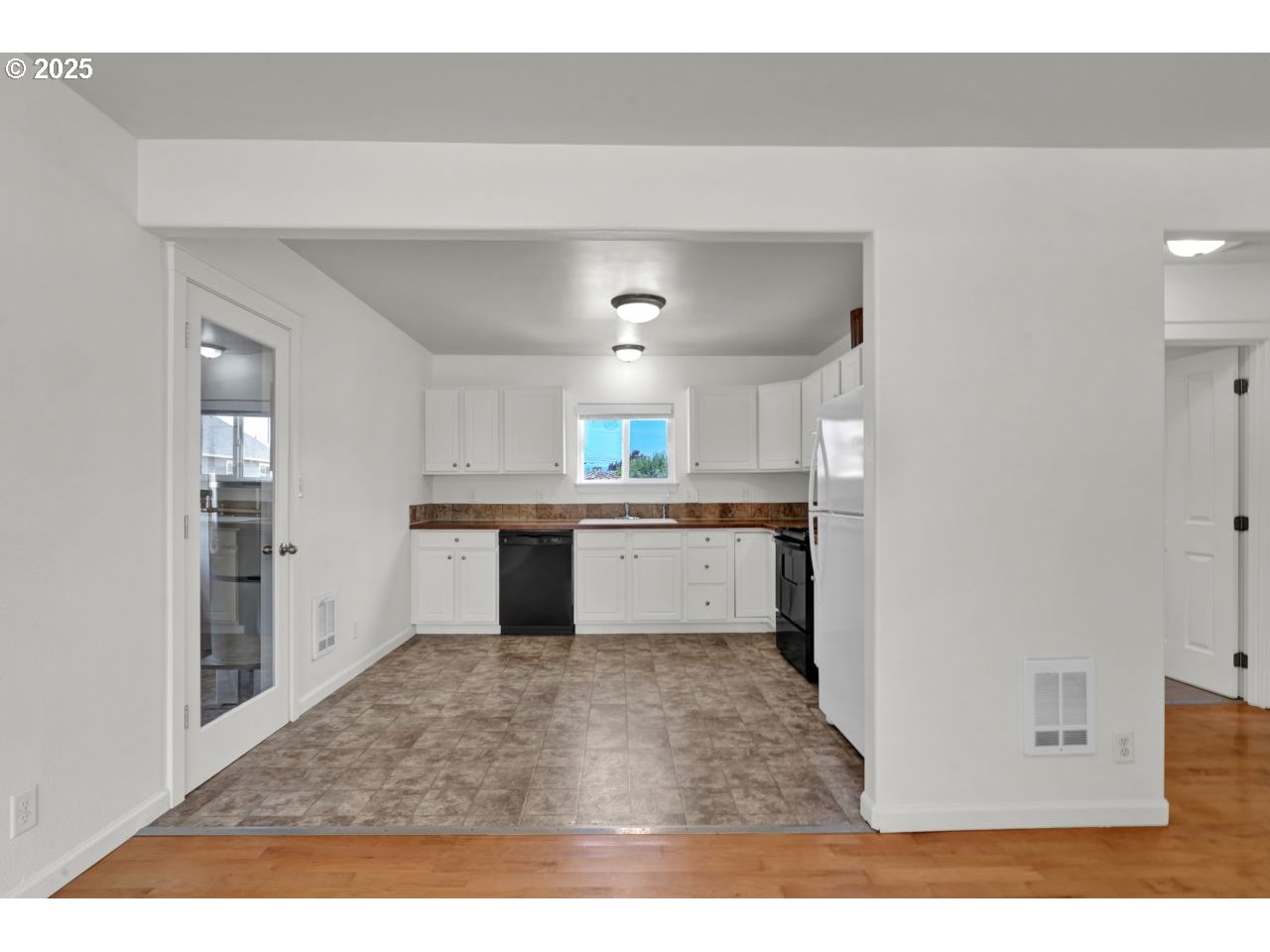 475 North 35th Street Springfield, OR 97478 - Photo 11 of 20 a kitchen with a refrigerator and a sink