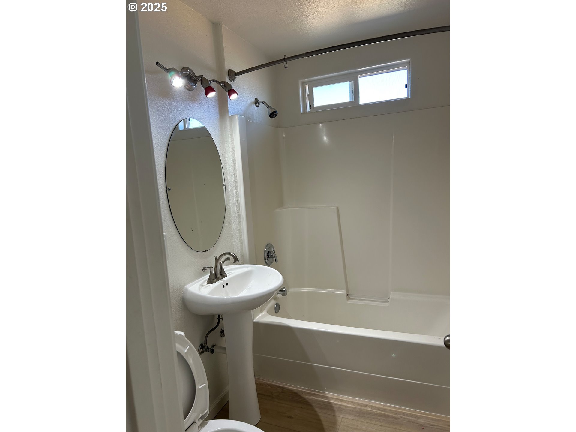 475 North 35th Street Springfield, OR 97478 - Photo 5 of 20 a bathroom with a sink a toilet and shower