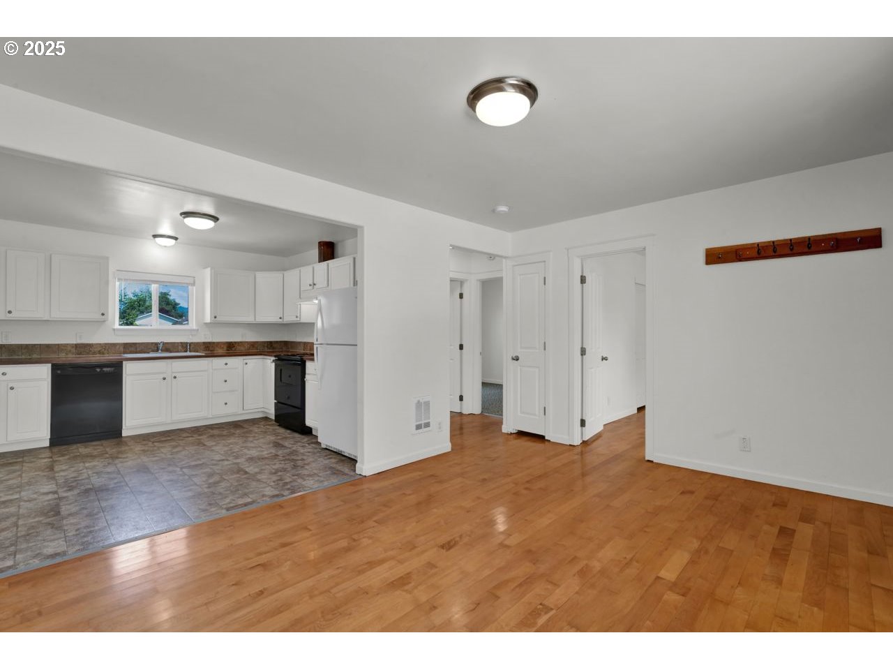 475 North 35th Street Springfield, OR 97478 - Photo 7 of 20 a view of a kitchen with wooden floor