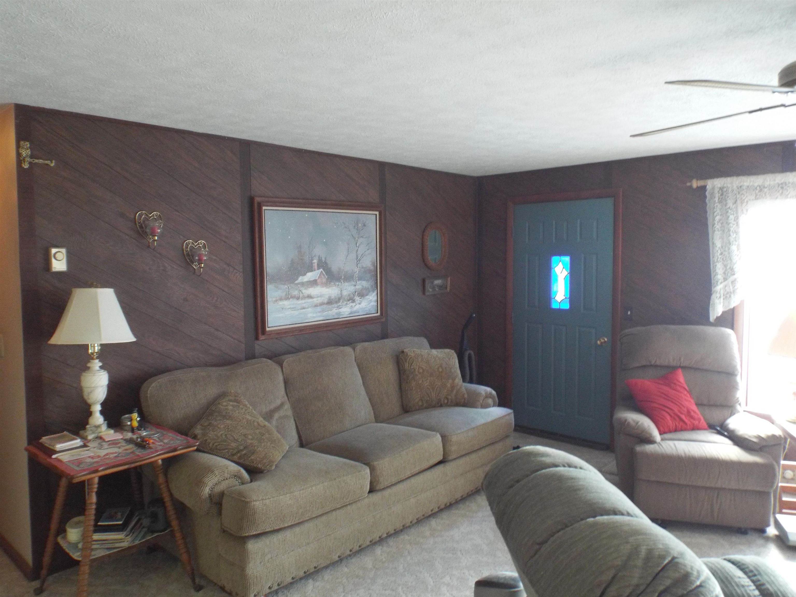 133 Mathilda Drive Stockton, IL 61085 - Photo 5 of 15 a living room with furniture and a window
