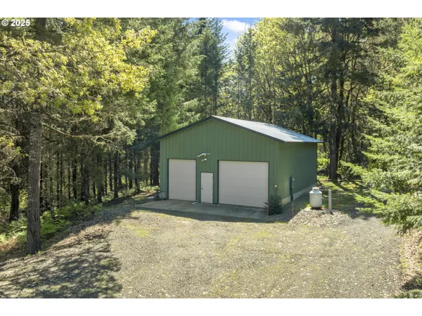 a house with trees in front of it