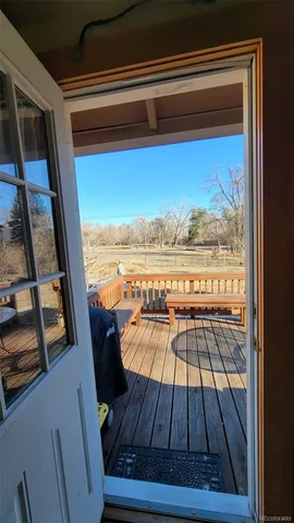 a view of deck and hardwood floor