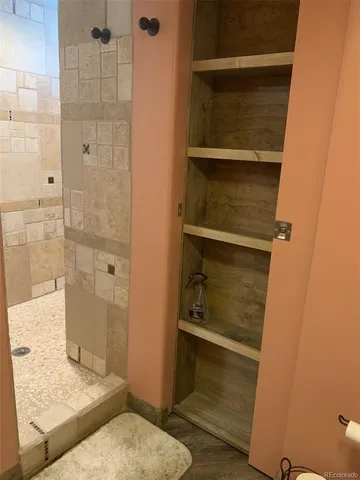 a stove top oven sitting inside of a kitchen