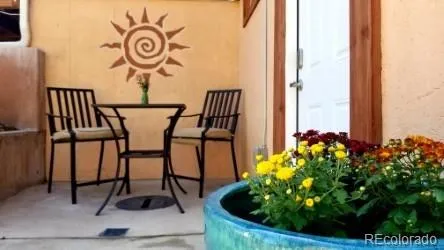 a view of entryway with a table and chairs