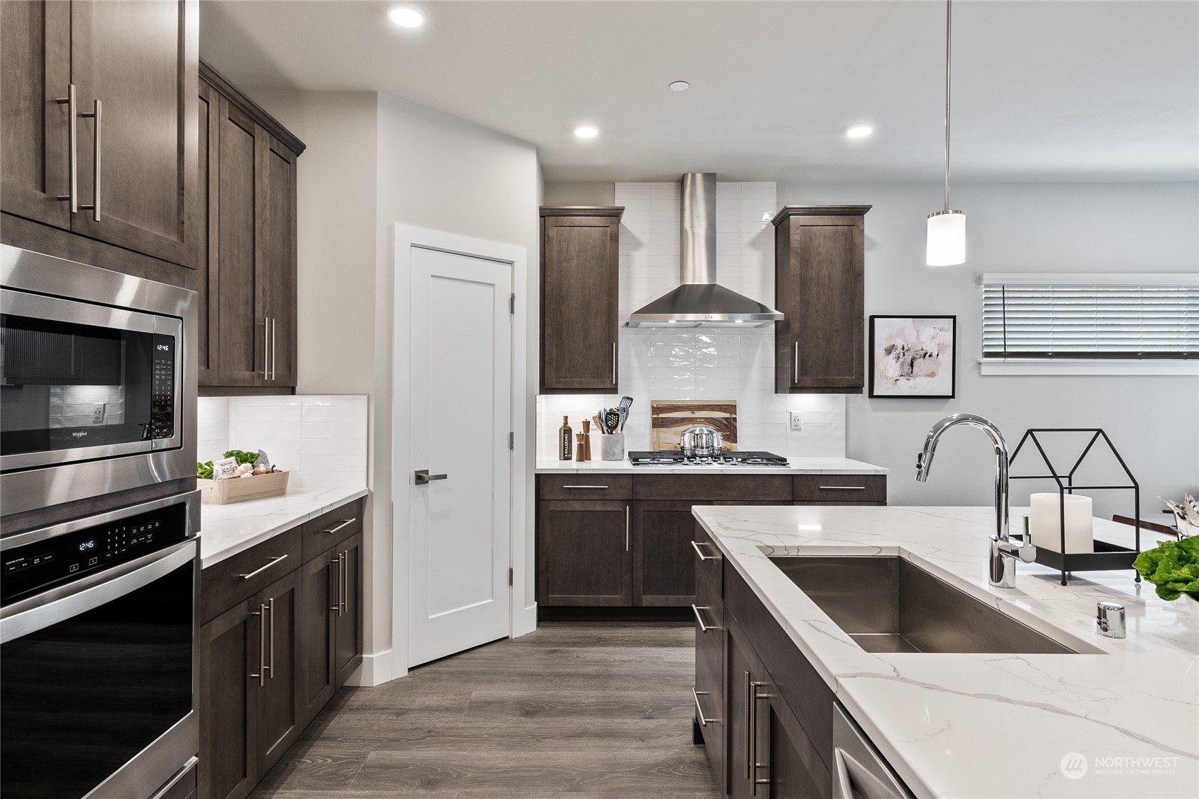 119 177th Street Southeast Bothell, WA 98012 - Photo 2 of 32 a kitchen with a sink stove and refrigerator