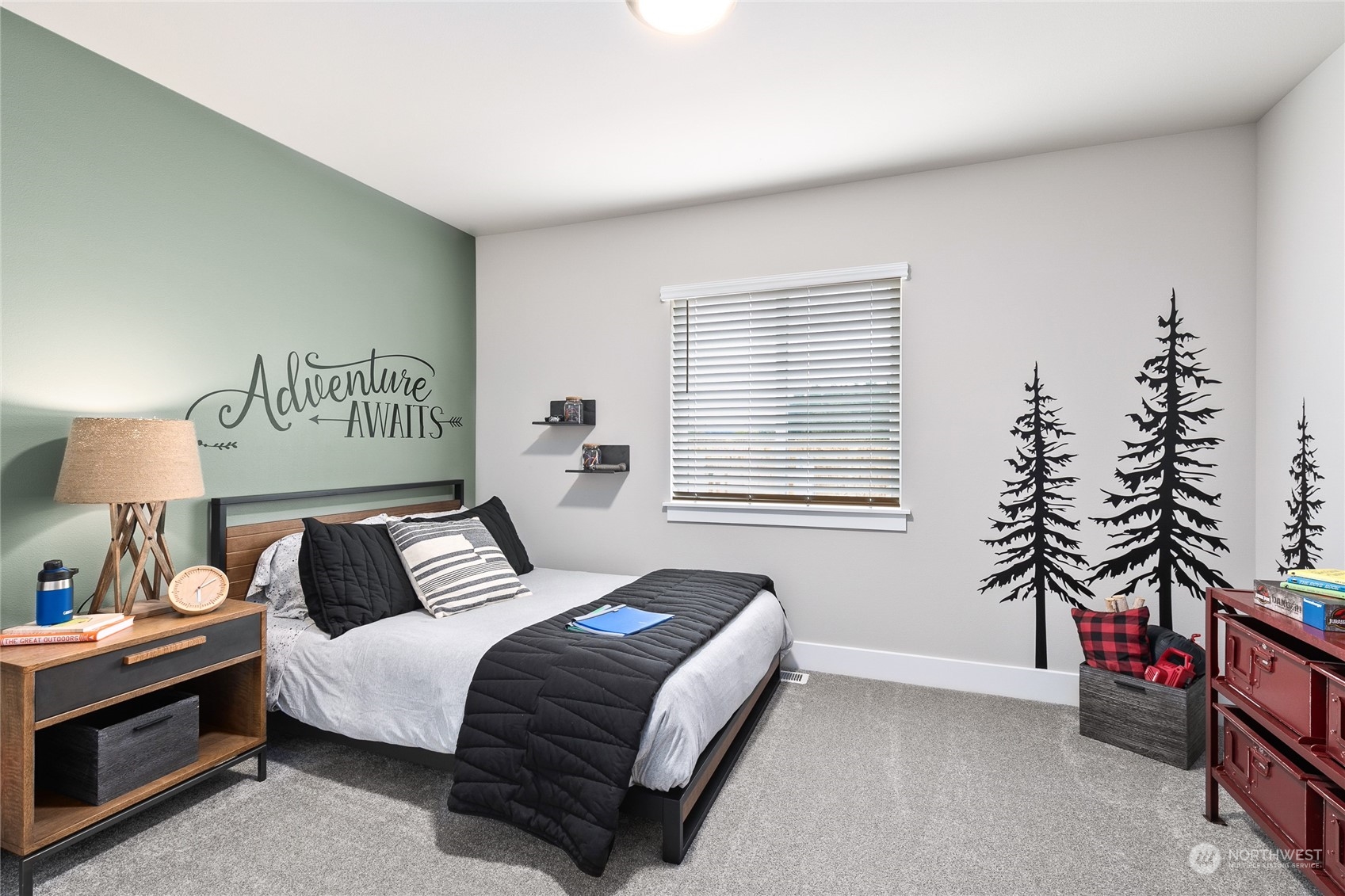 119 177th Street Southeast Bothell, WA 98012 - Photo 27 of 32 a bedroom with a bed and a potted plant next to a window