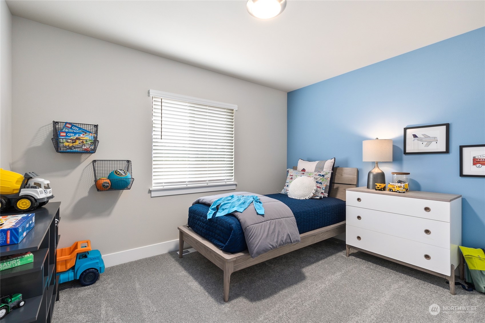 119 177th Street Southeast Bothell, WA 98012 - Photo 28 of 32 a bedroom with a bed and a window